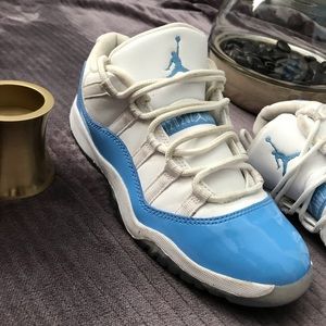White and Blue Youth Jordan’s sneakers